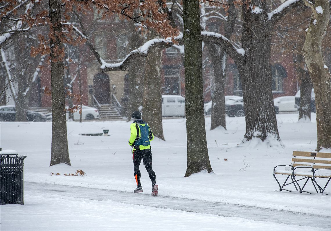 Person jogging in winter.