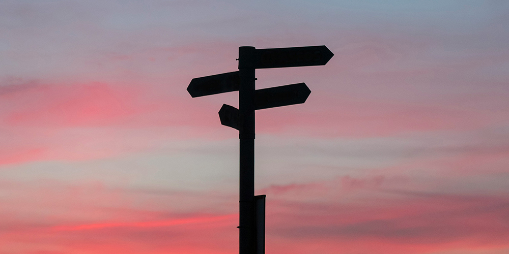 A signpost in the sunset